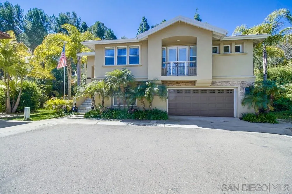 2305 Falkirk Row La Jolla, CA 92037 - Photo 36 of 36 a front view of a house with a yard and garage
