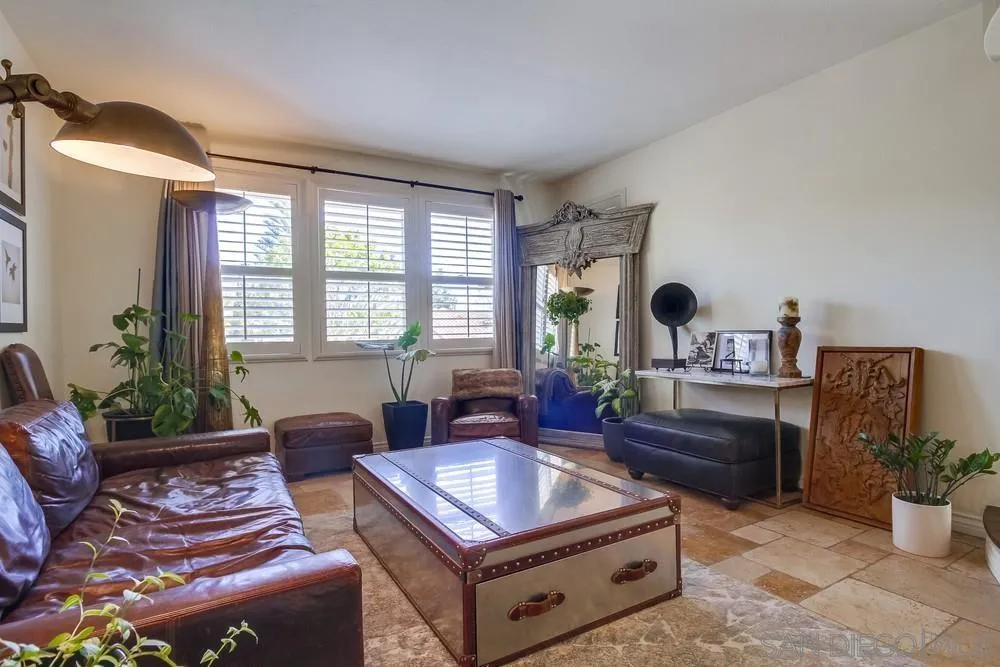 2305 Falkirk Row La Jolla, CA 92037 - Photo 6 of 36 a living room with furniture and a potted plant