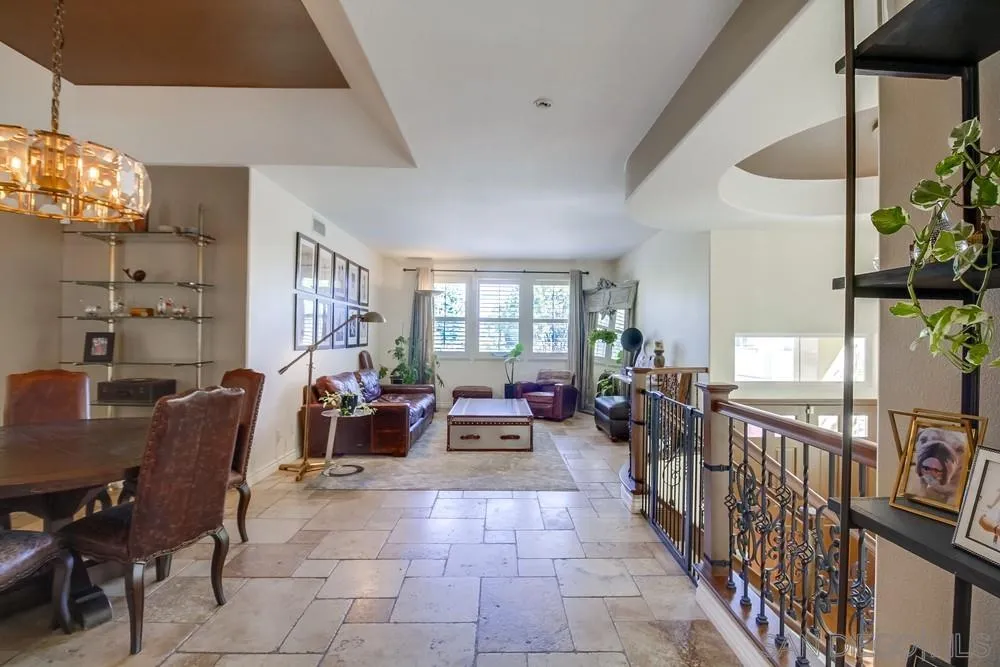 2305 Falkirk Row La Jolla, CA 92037 - Photo 8 of 36 a living room with lots of furniture and a chandelier