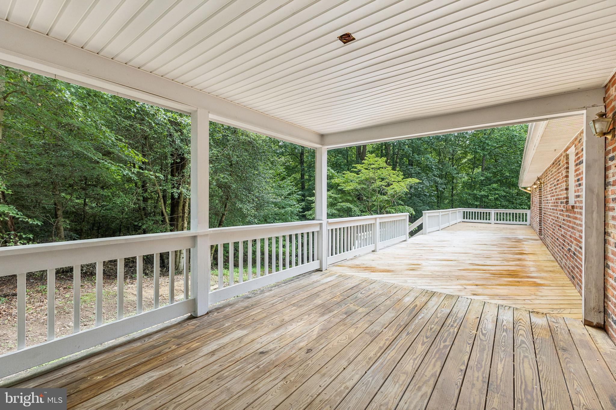 10664 Deacon Road White Plains, MD 20695 - Photo 42 of 50 Covered Deck off Primary Bedroom