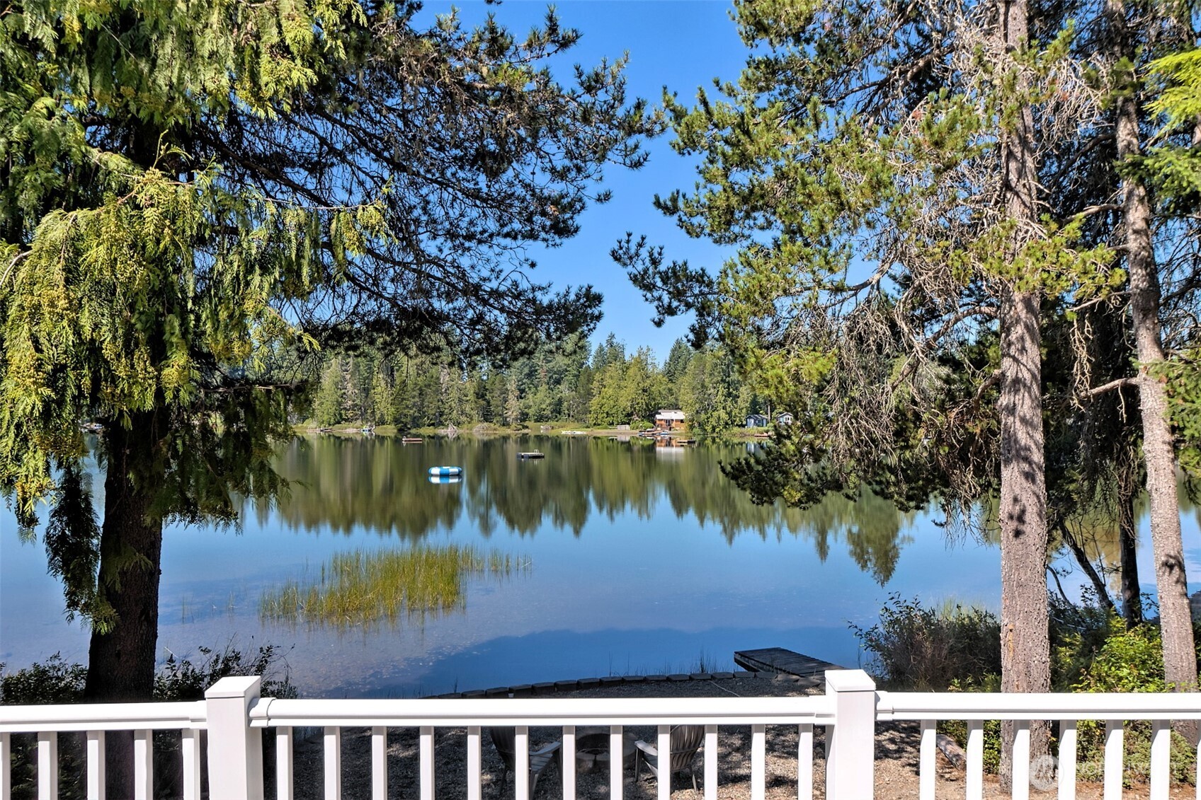 1091 E Trail Belfair, WA 98528 - Photo 1 of 31 a view of a lake from a tree