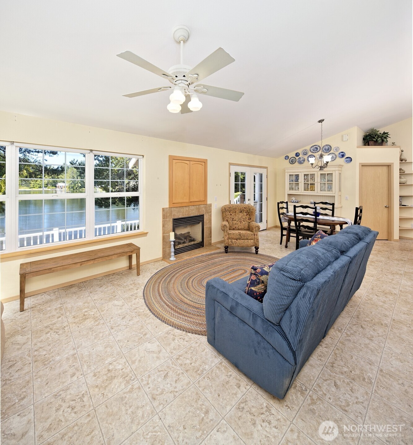 1091 E Trail Belfair, WA 98528 - Photo 13 of 31 a living room with furniture and a fireplace
