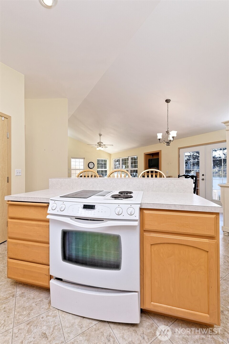 1091 E Trail Belfair, WA 98528 - Photo 19 of 31 a kitchen with stove cabinets and a sink