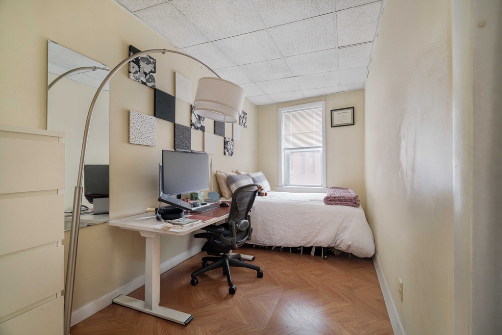 99 Prince Street, Unit 6 Boston, MA 02113 - Photo 7 of 14 a bedroom with a workspace