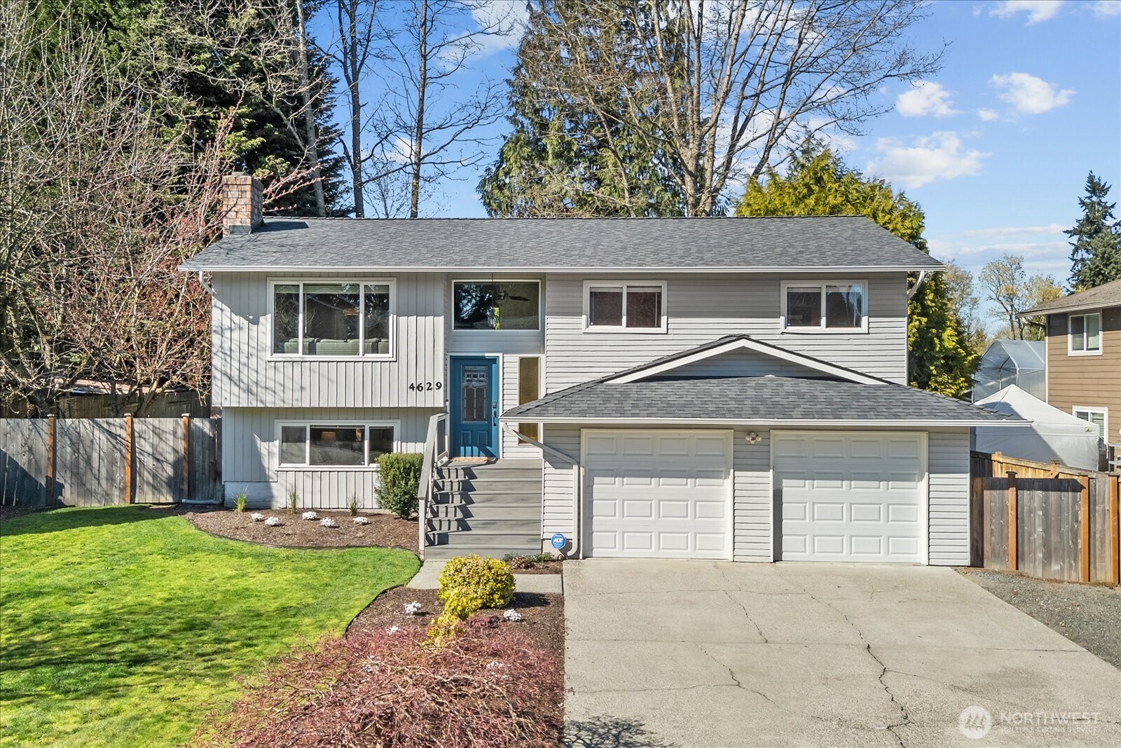4629 128th Place Southeast Everett, WA 98208 - Photo 1 of 39 a front view of a house with garden