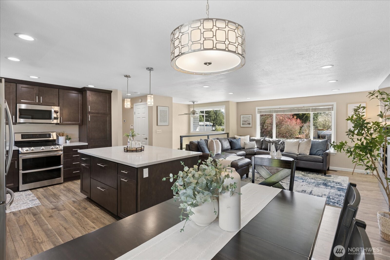 4629 128th Place Southeast Everett, WA 98208 - Photo 12 of 39 a large kitchen with a table and chairs