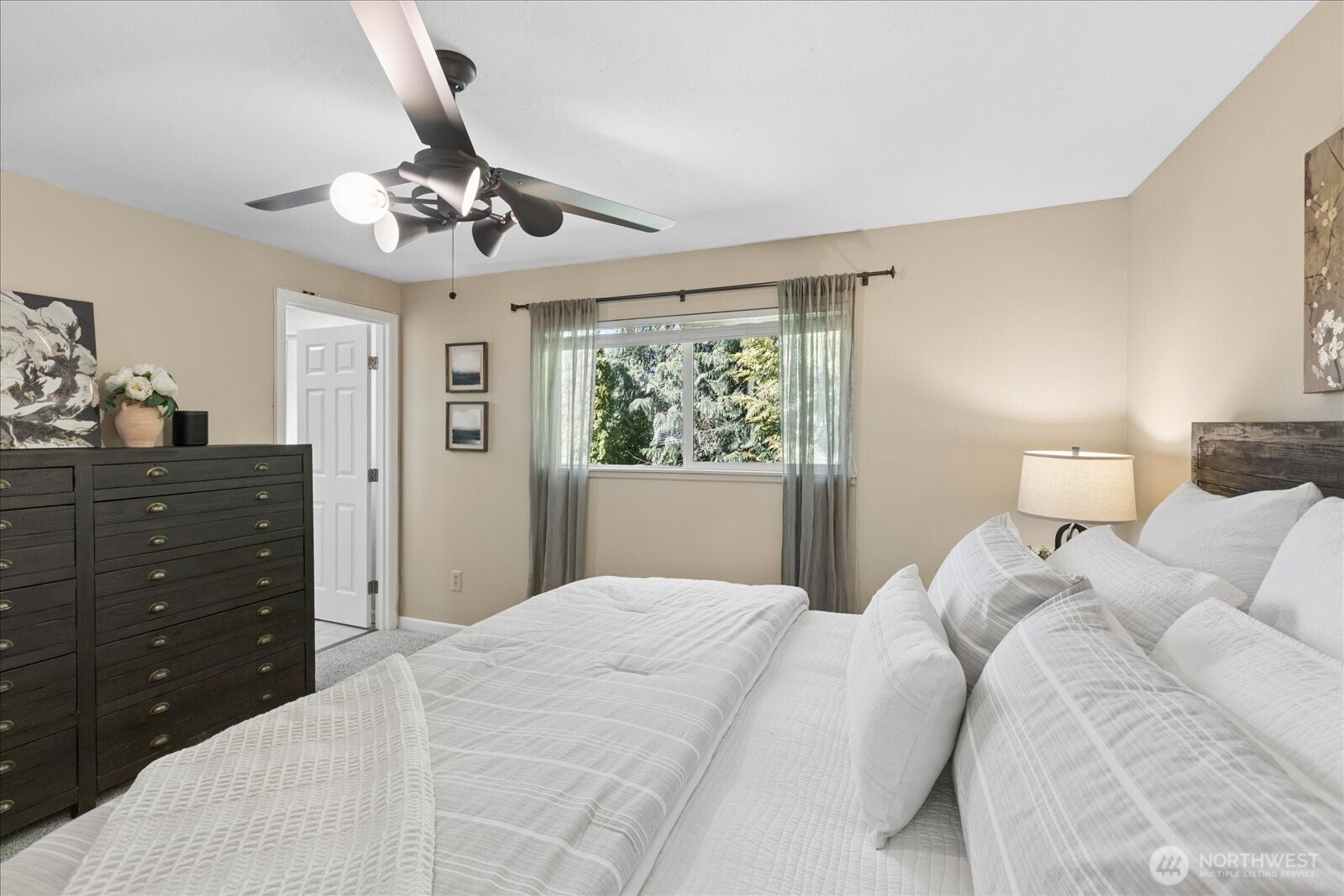 4629 128th Place Southeast Everett, WA 98208 - Photo 16 of 39 a bedroom with a bed and a dresser