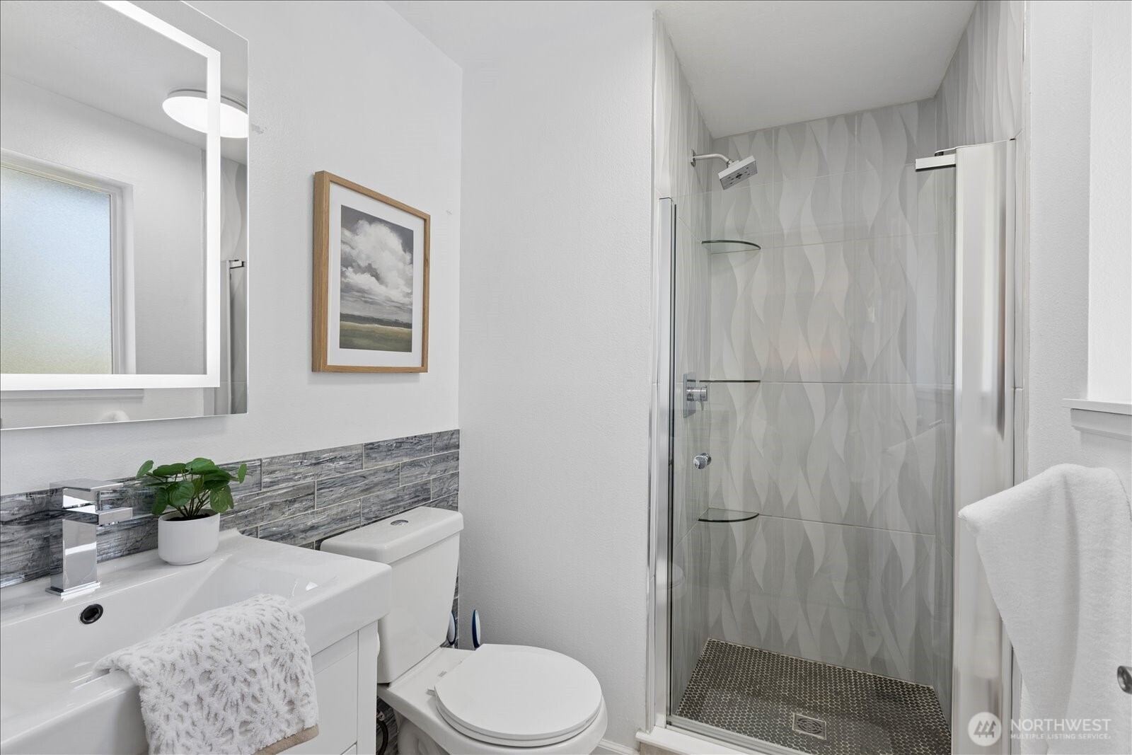 4629 128th Place Southeast Everett, WA 98208 - Photo 18 of 39 a bathroom with a granite countertop sink toilet and shower
