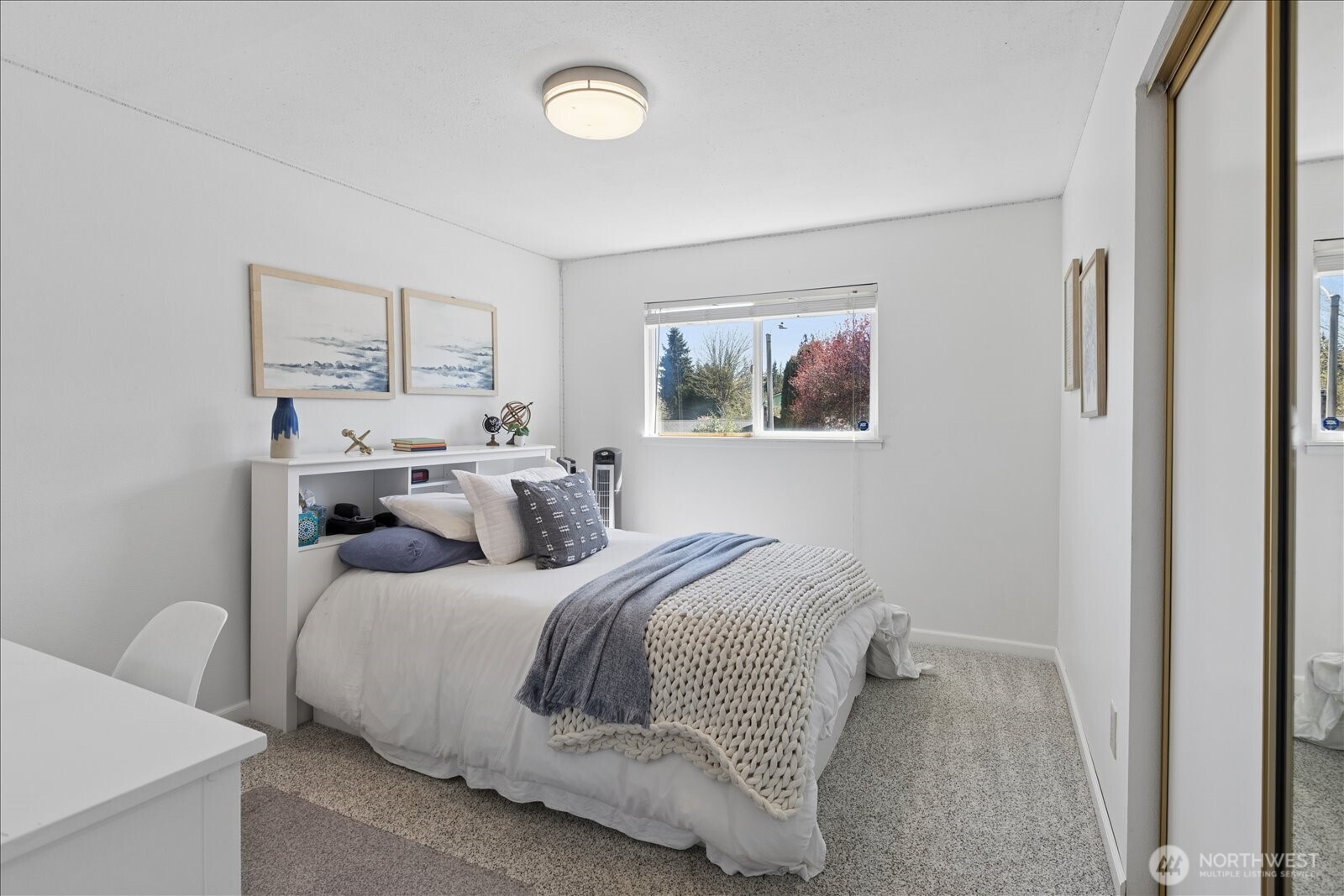 4629 128th Place Southeast Everett, WA 98208 - Photo 19 of 39 a bedroom with a bed and a painting on the wall