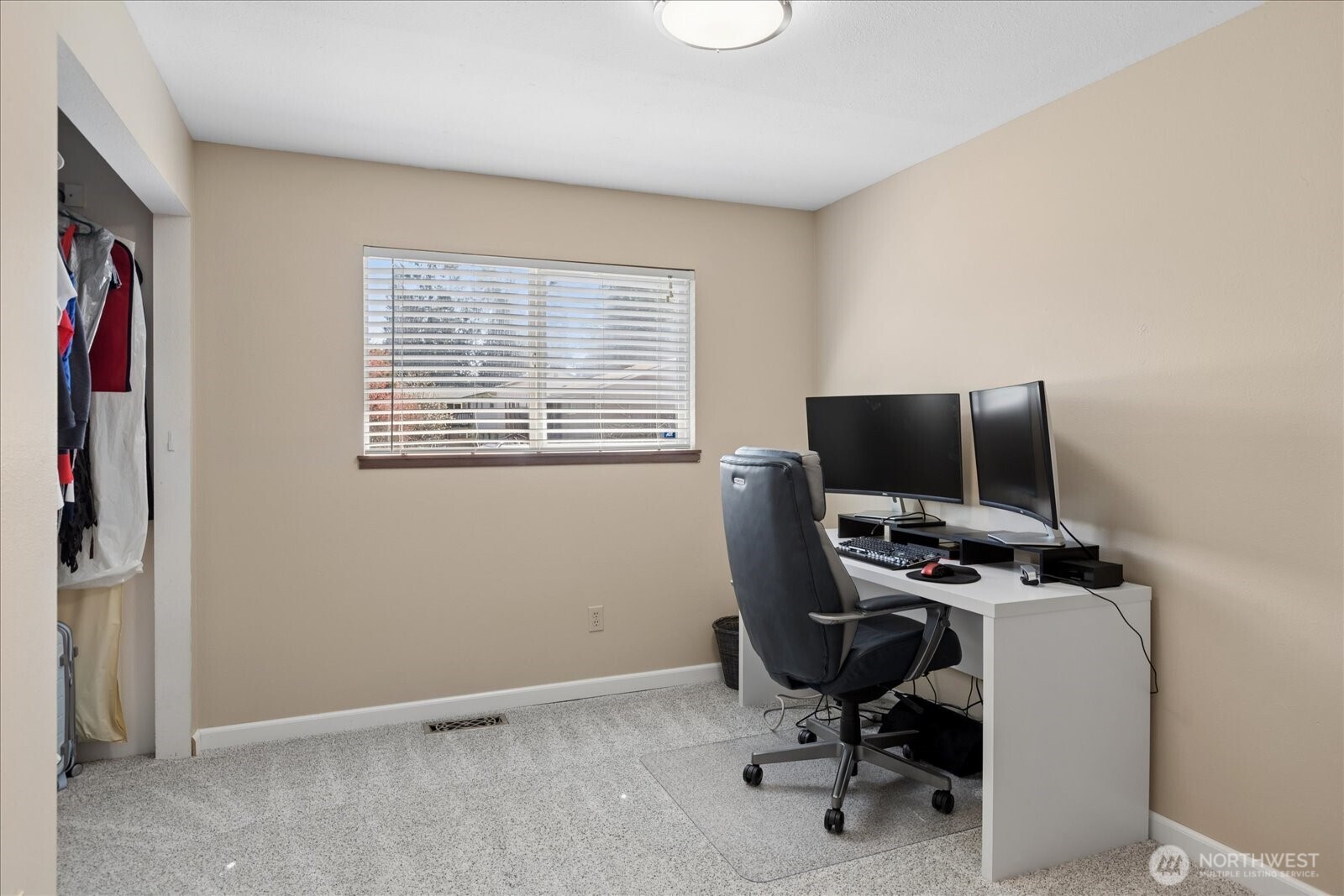 4629 128th Place Southeast Everett, WA 98208 - Photo 21 of 39 a view of a workspace with furniture and a window