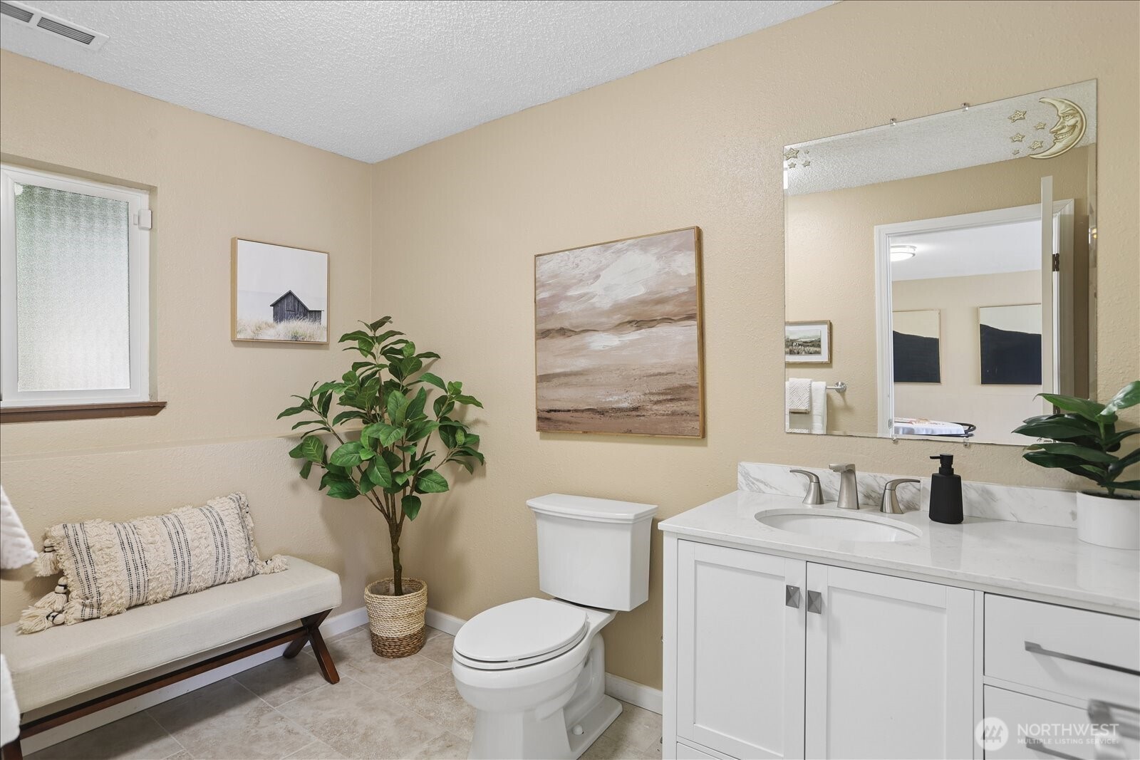4629 128th Place Southeast Everett, WA 98208 - Photo 28 of 39 a bathroom with a toilet a sink and mirror