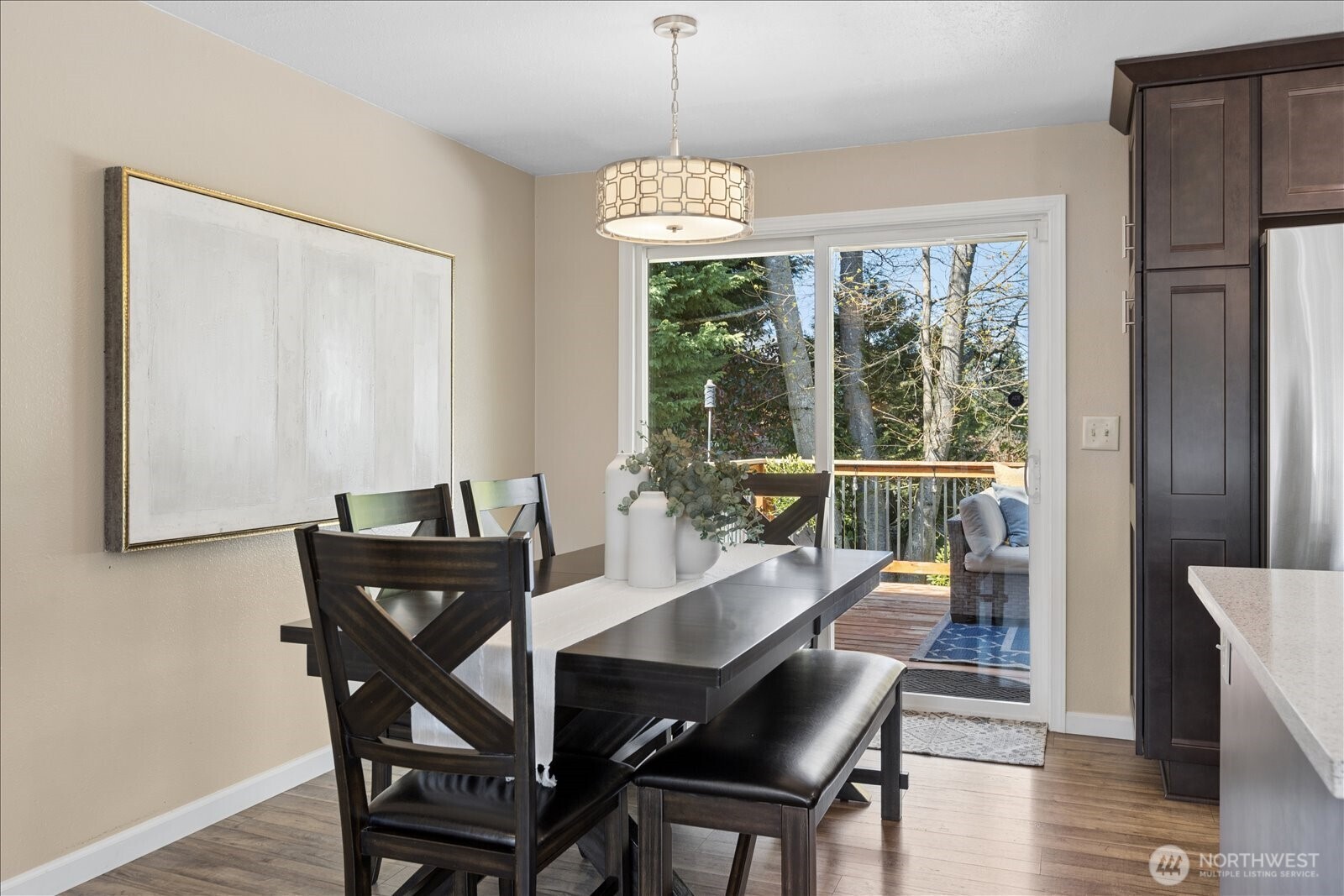 4629 128th Place Southeast Everett, WA 98208 - Photo 5 of 39 a view of a dining room with furniture window and wooden floor