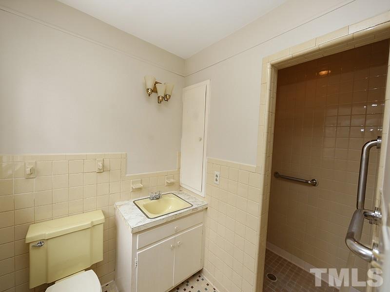 3412 Noel Court Raleigh, NC 27607 - Photo 18 of 25 a bathroom with a sink toilet and shower