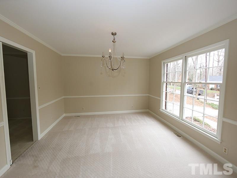 3412 Noel Court Raleigh, NC 27607 - Photo 6 of 25 a view of an empty room with a window