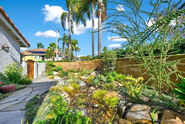a house view with a garden space
