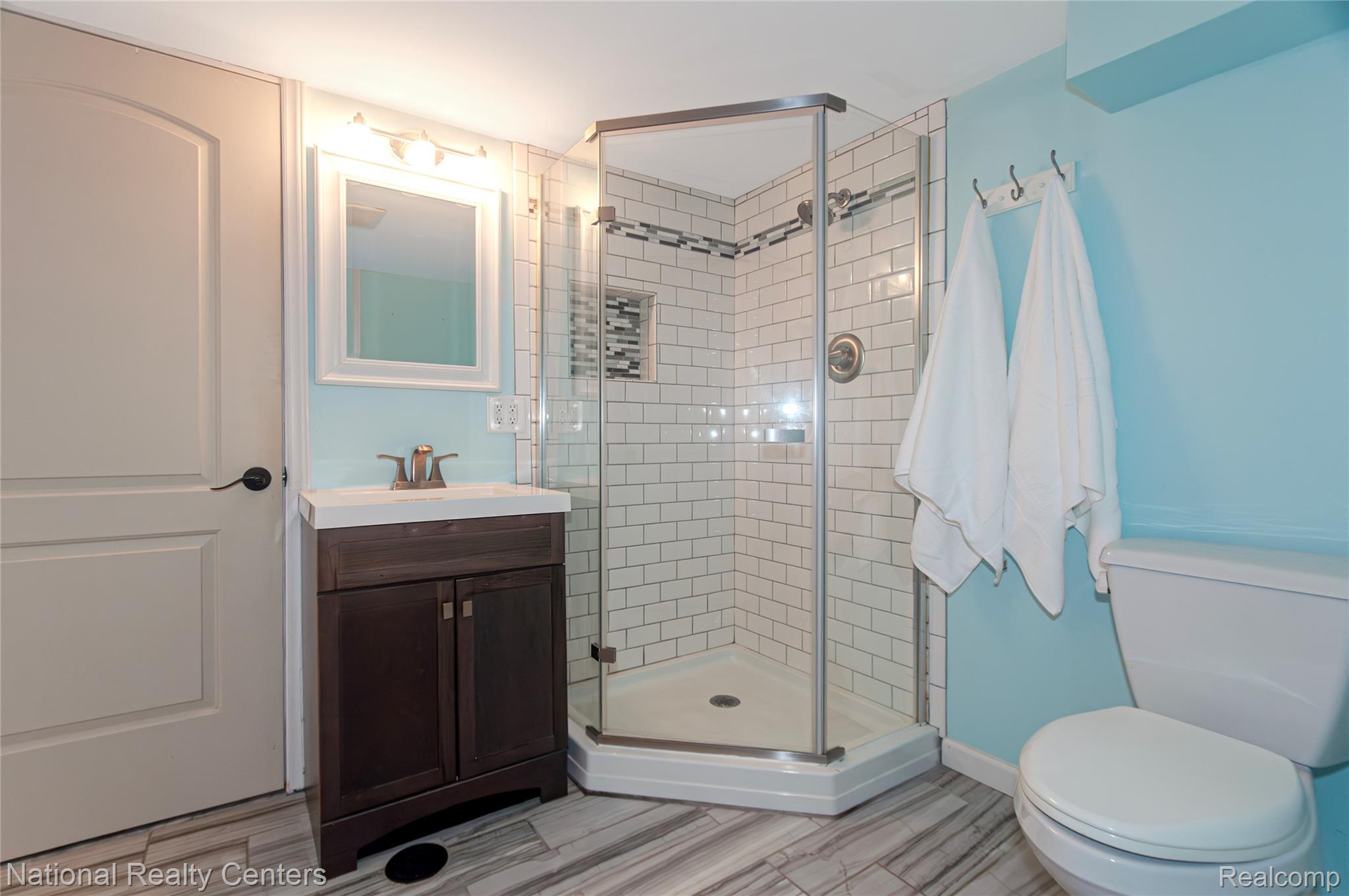2446 Milverton Road Troy, MI 48083 - Photo 31 of 41 Bathroom featuring a shower stall and vanity
