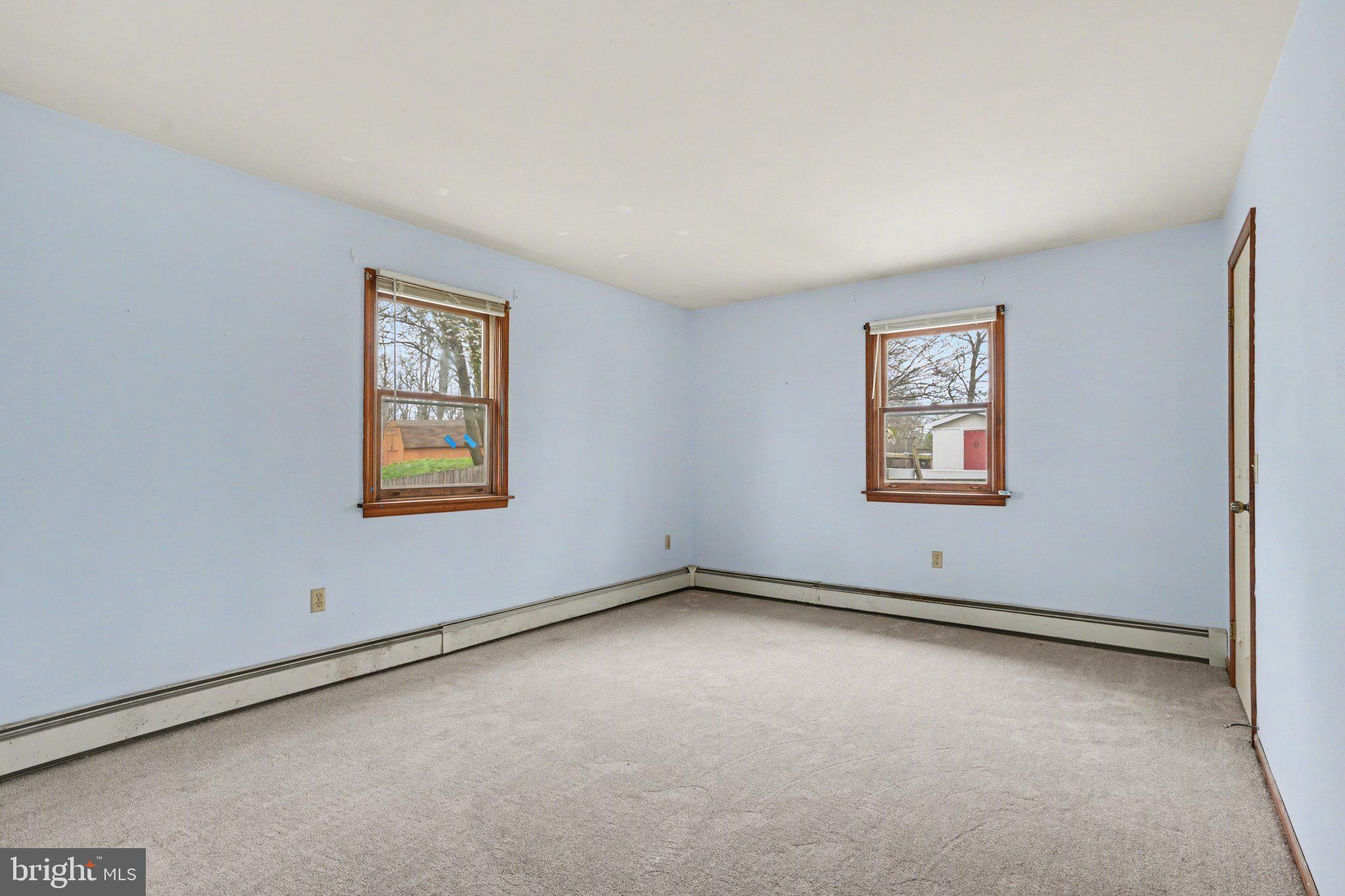 711 West Siddonsburg Road Dillsburg, PA 17019 - Photo 12 of 26 an empty room with windows