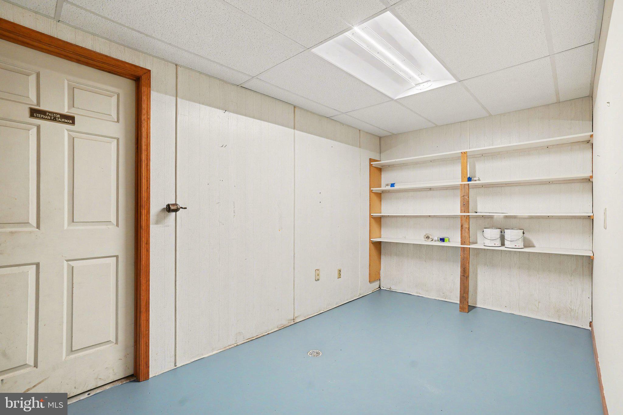 711 West Siddonsburg Road Dillsburg, PA 17019 - Photo 21 of 26 a view of an empty room with empty shelves