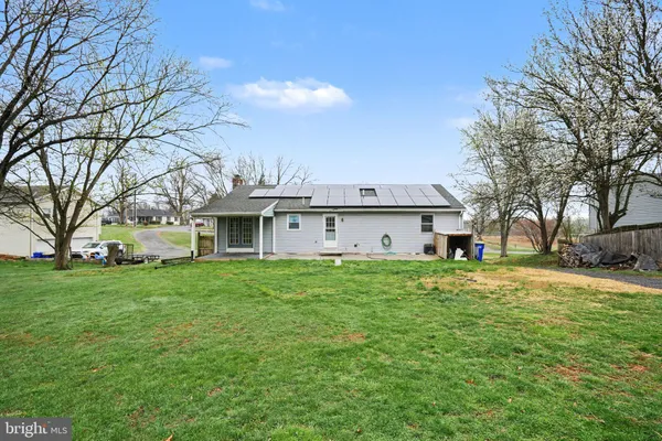 a view of a house with a big yard