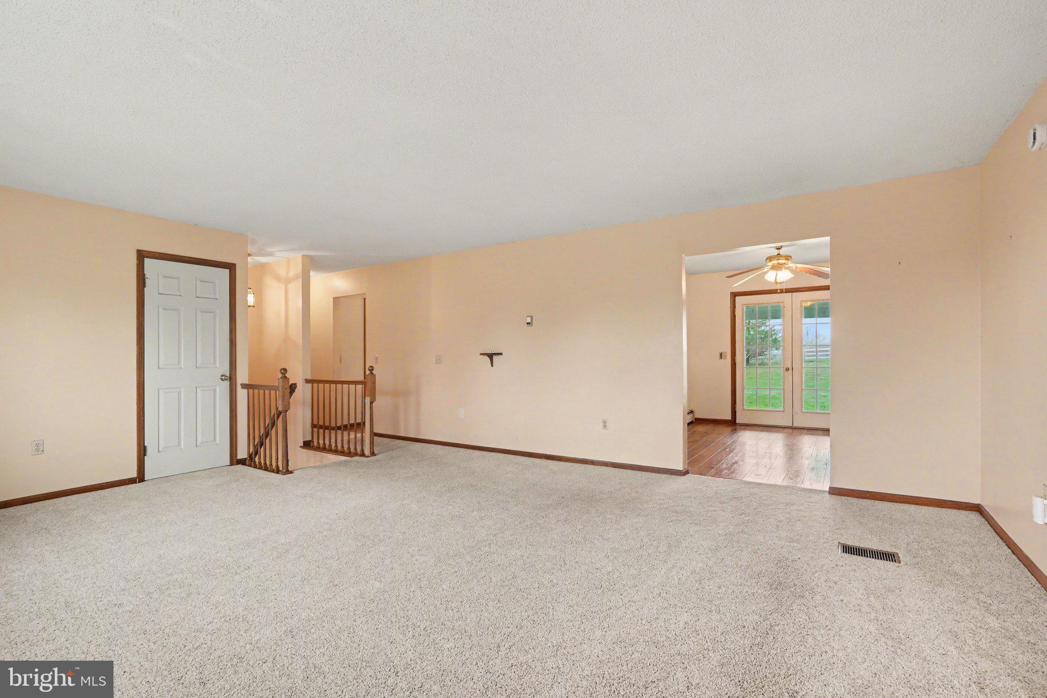 711 West Siddonsburg Road Dillsburg, PA 17019 - Photo 4 of 26 an empty room with windows