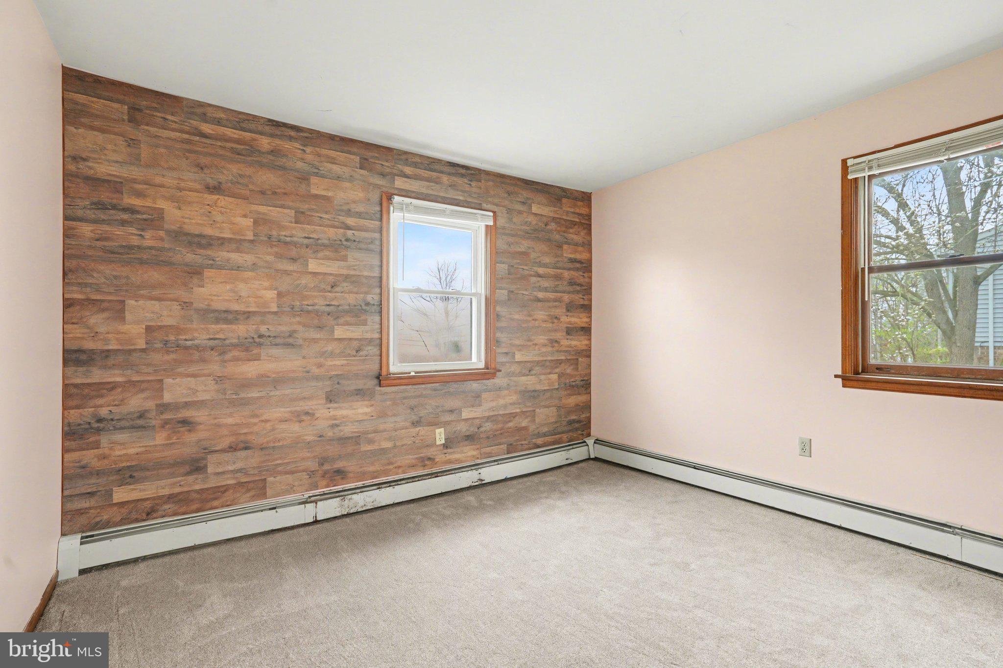 711 West Siddonsburg Road Dillsburg, PA 17019 - Photo 9 of 26 an empty room with windows