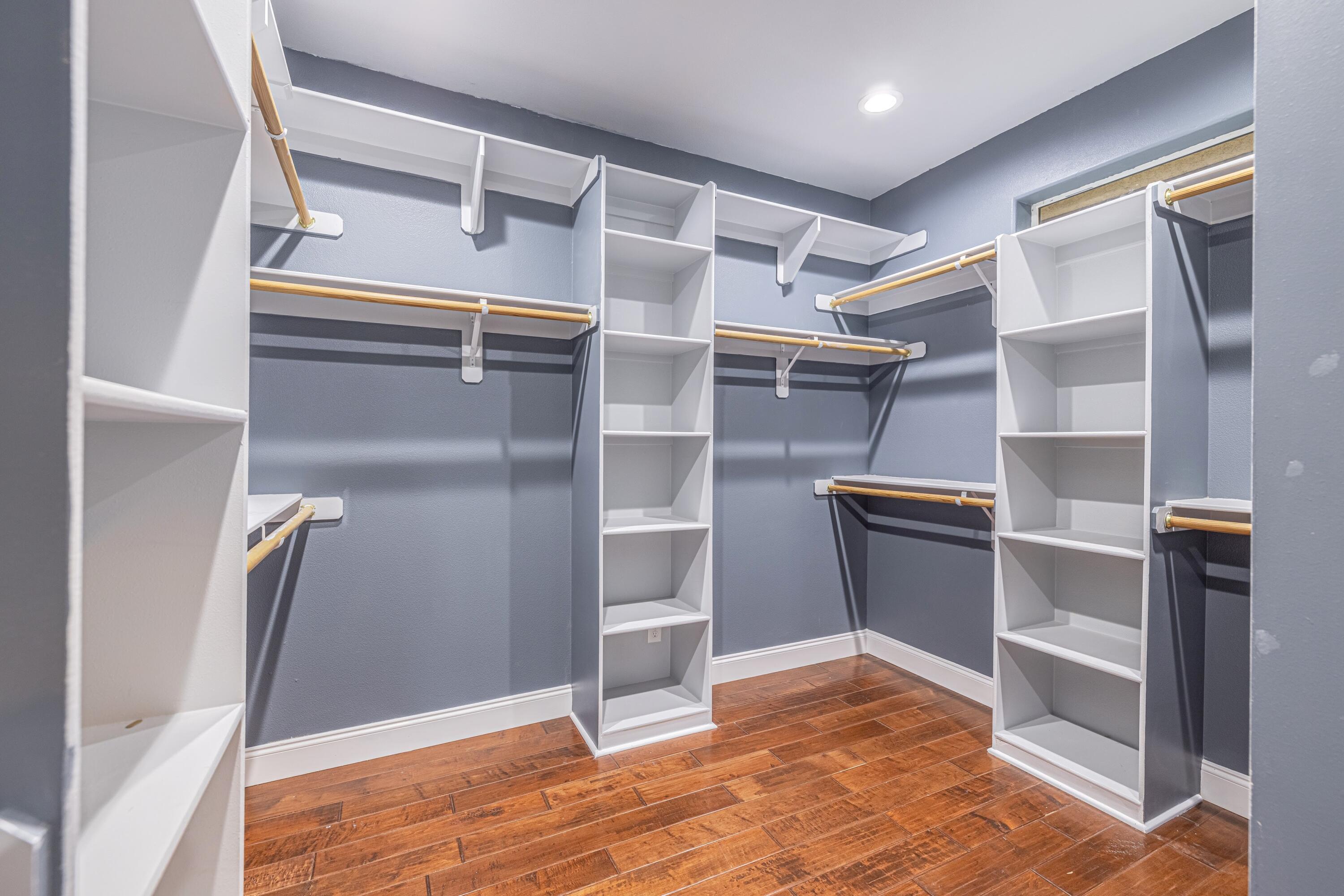 4023 Derby Circle Lancaster, CA 93536 - Photo 20 of 53 a view of an empty room with wooden floor and closet