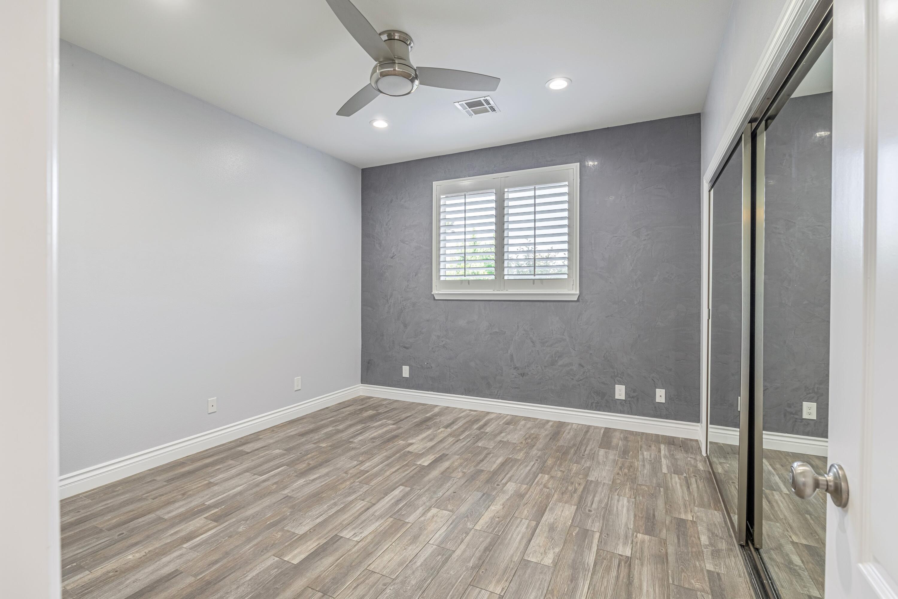 4023 Derby Circle Lancaster, CA 93536 - Photo 27 of 53 a view of room with window and hardwood floor