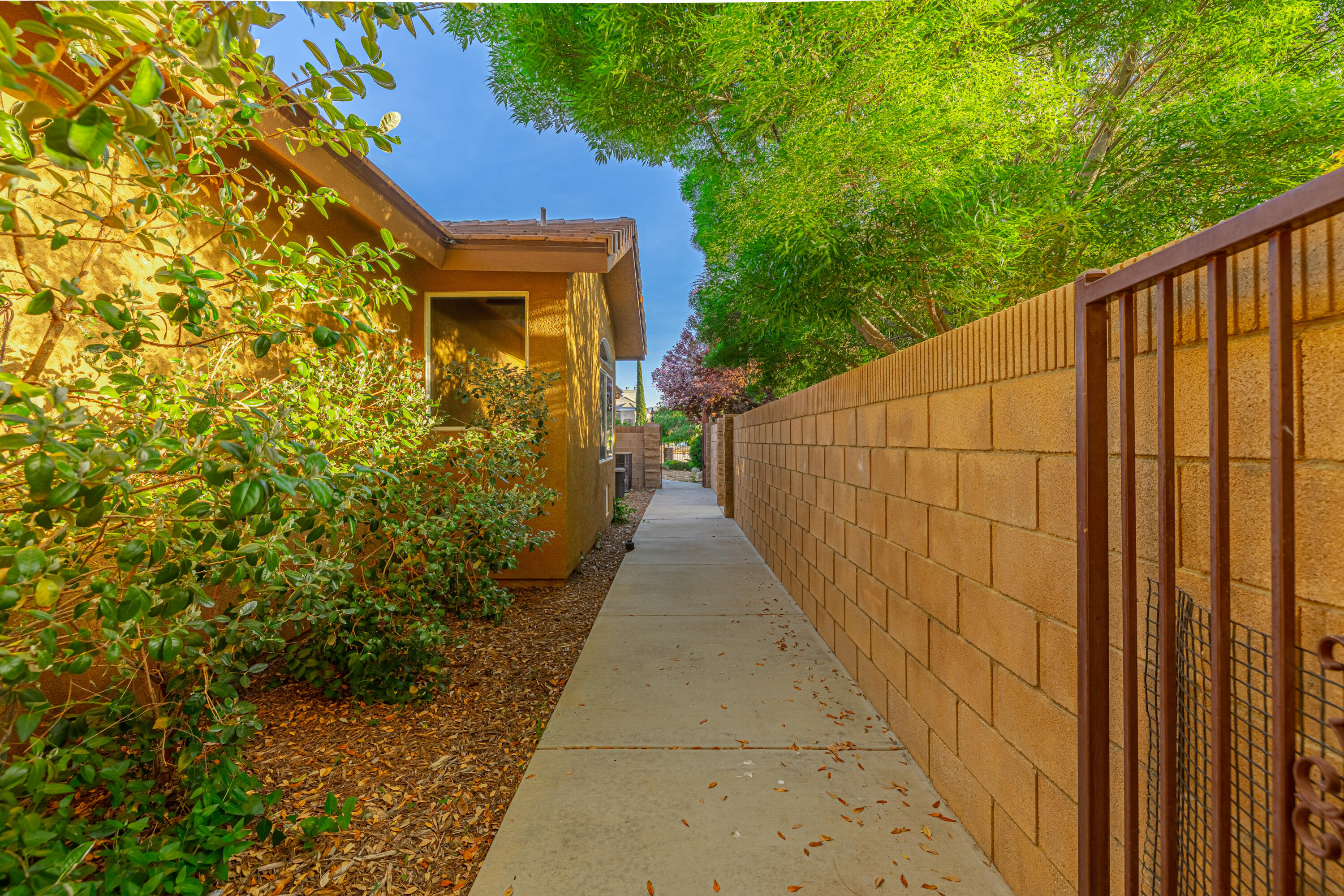 4023 Derby Circle Lancaster, CA 93536 - Photo 49 of 53 a view of a pathway of a building with a small yard