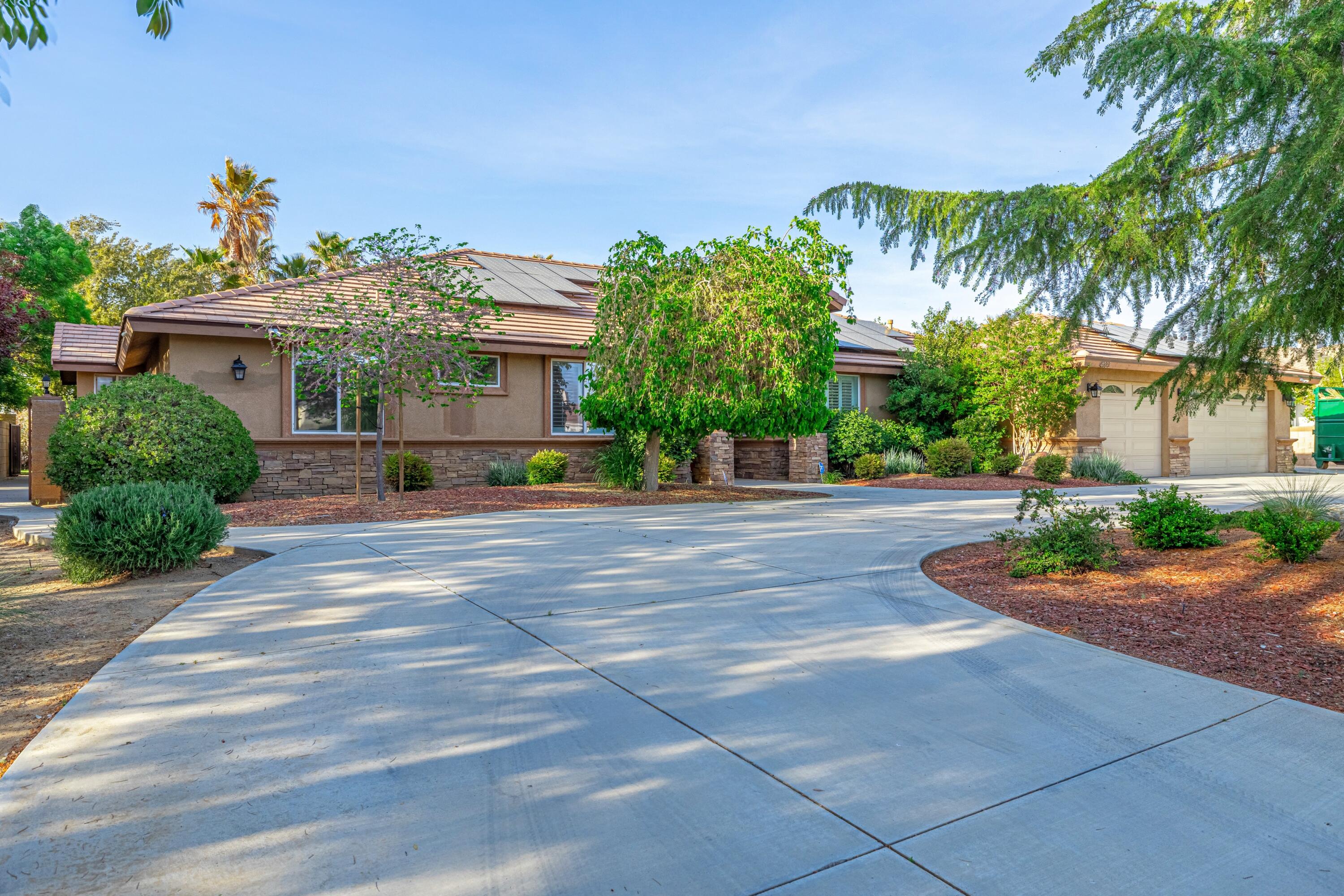 4023 Derby Circle Lancaster, CA 93536 - Photo 51 of 53 a view of a house with palm trees