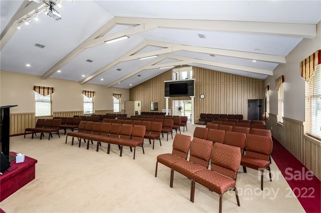 3521 Section House Road Hickory, NC 28601 - Photo 15 of 48 a living room with furniture a rug and a flat screen tv