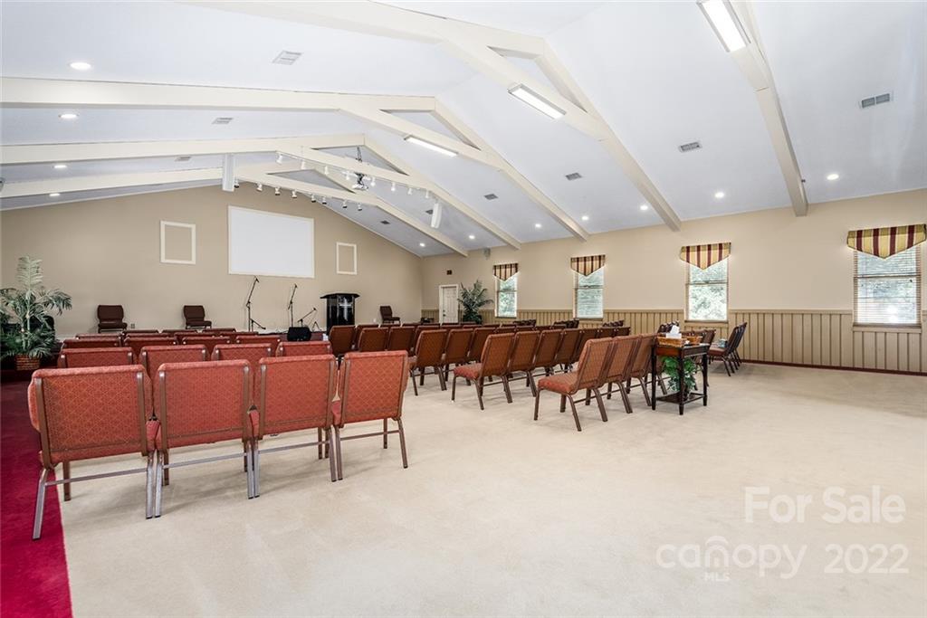 3521 Section House Road Hickory, NC 28601 - Photo 18 of 48 a group of people sitting in a room with chairs