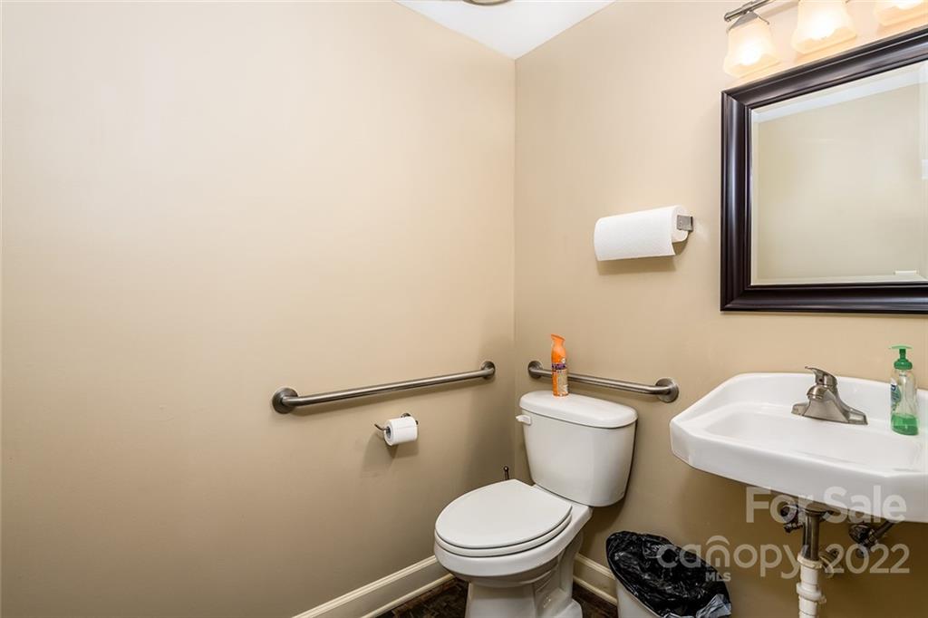 3521 Section House Road Hickory, NC 28601 - Photo 20 of 48 a bathroom with a toilet a sink and mirror