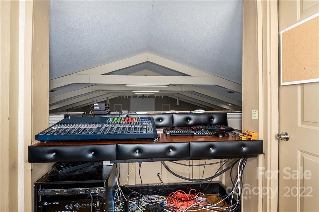 3521 Section House Road Hickory, NC 28601 - Photo 21 of 48 a ceiling fan sitting next to a rack