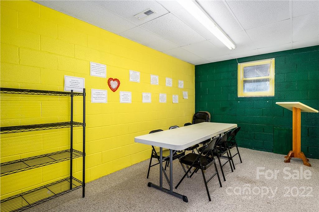 3521 Section House Road Hickory, NC 28601 - Photo 26 of 48 a view of a patio with table and chairs