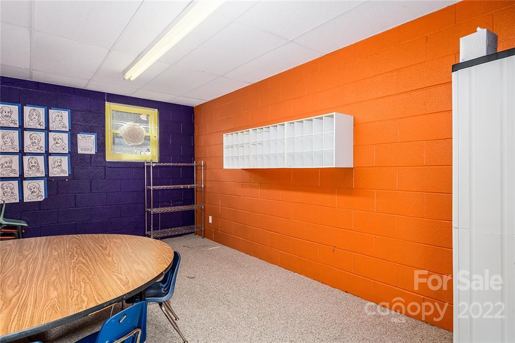3521 Section House Road Hickory, NC 28601 - Photo 27 of 48 a room with wooden floor and furniture