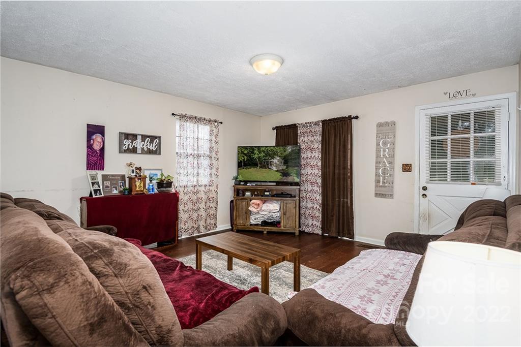 3521 Section House Road Hickory, NC 28601 - Photo 40 of 48 a bedroom with a bed and wooden floor