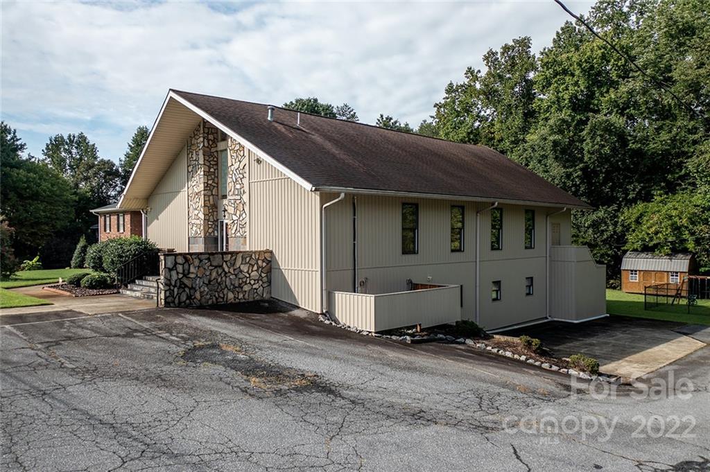 3521 Section House Road Hickory, NC 28601 - Photo 6 of 48 a view of a small house with wooden fence