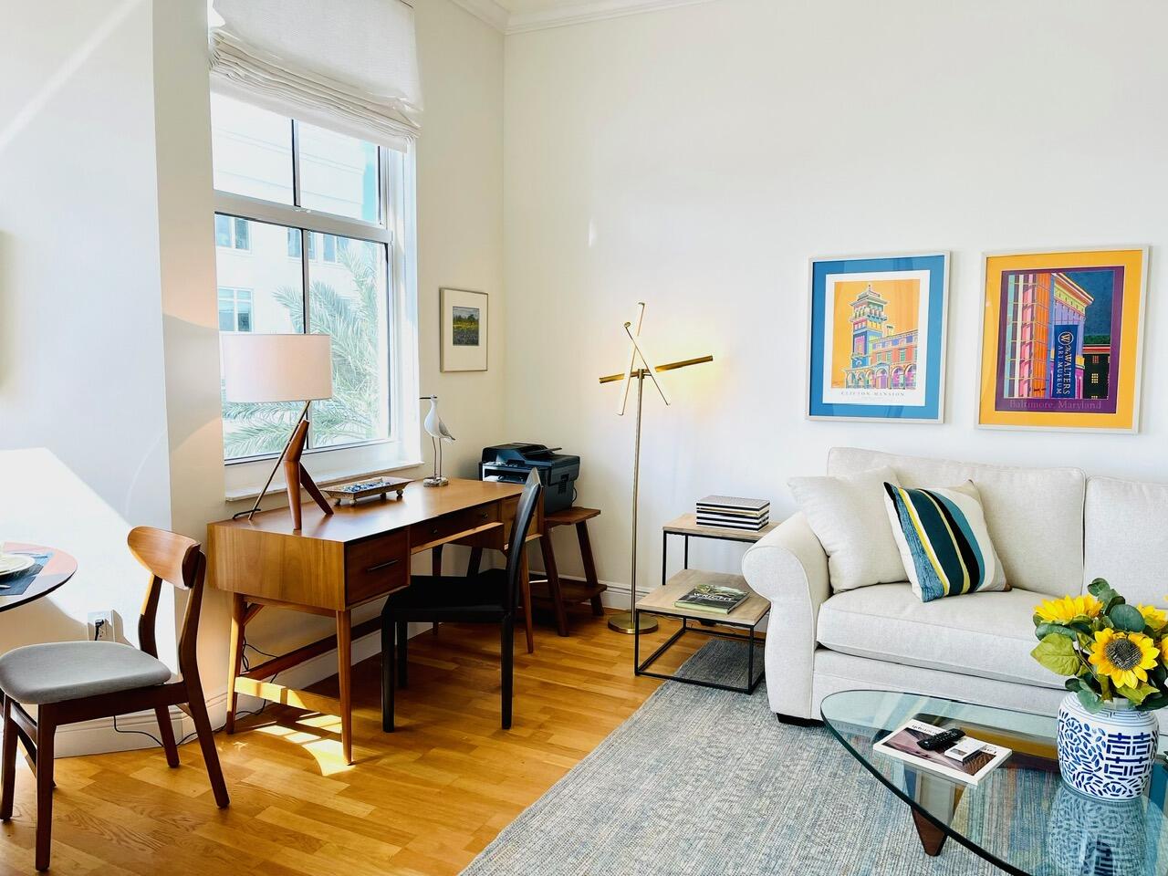 255 Evernia Street, Unit 407 West Palm Beach, FL 33401 - Photo 11 of 31 a living room with furniture and a window
