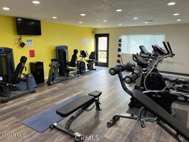 24303 Woolsey Canoga Park, Unit 26 Los Angeles, CA 90068 - Photo 26 of 28 a view of a room with gym equipment