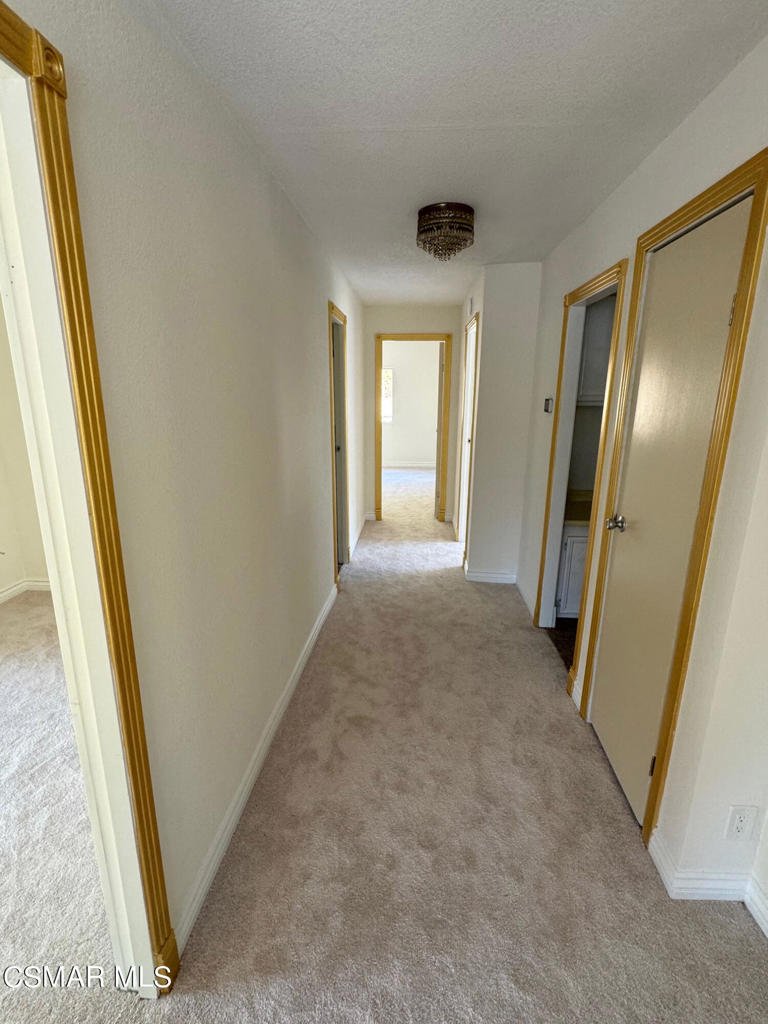 24303 Woolsey Canoga Park, Unit 26 Los Angeles, CA 90068 - Photo 9 of 28 a view of a hallway