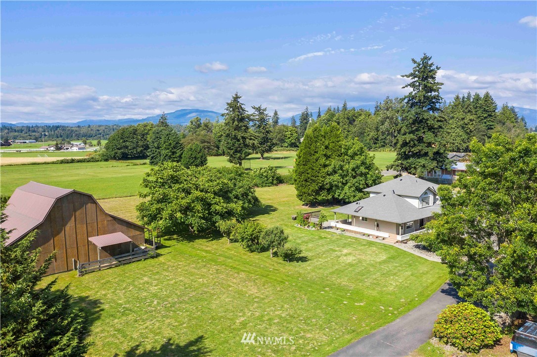 a view of a lake with a garden