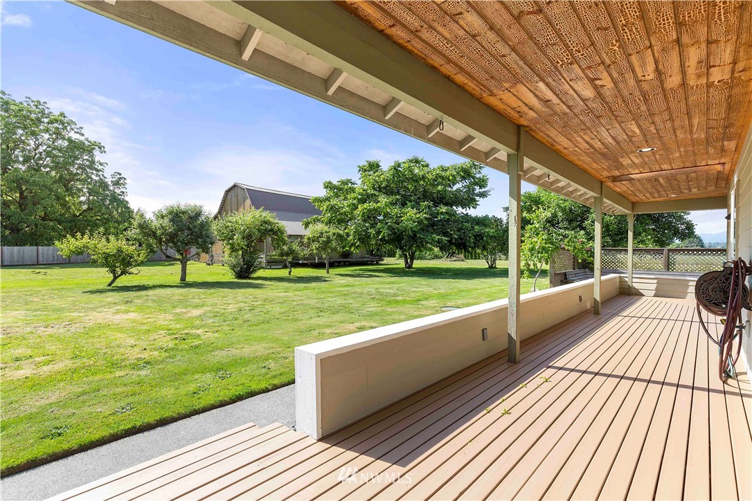 9451 Avon Allen Road Bow, WA 98232 - Photo 31 of 40 a view of a house with a yard