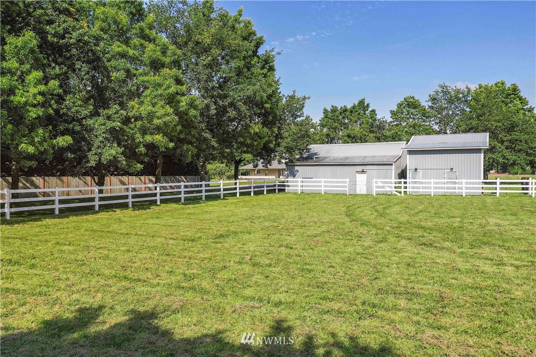 9451 Avon Allen Road Bow, WA 98232 - Photo 36 of 40 a view of a house with a big yard