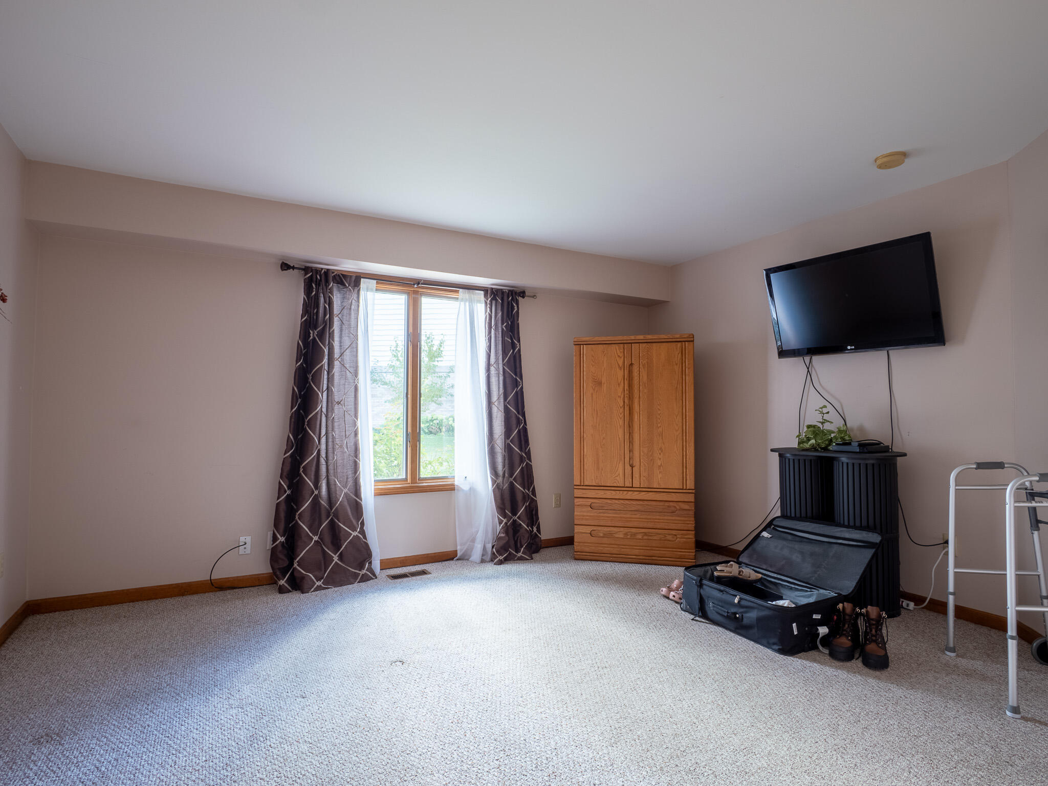1362 West 94th Court Crown Point, IN 46307 - Photo 11 of 23 a living room with furniture and a flat screen tv