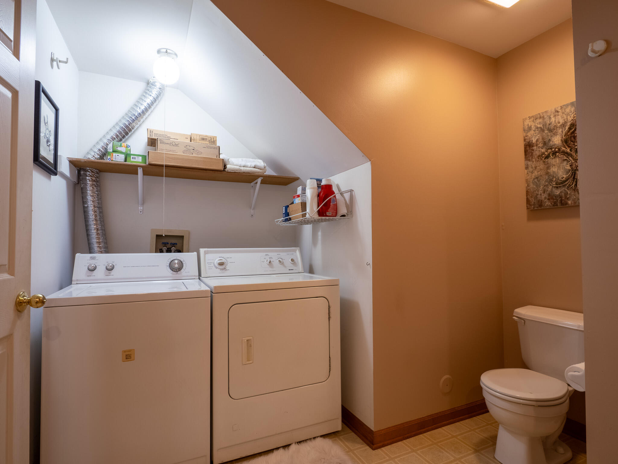 1362 West 94th Court Crown Point, IN 46307 - Photo 13 of 23 a view of storage and utility room with washer and dryer