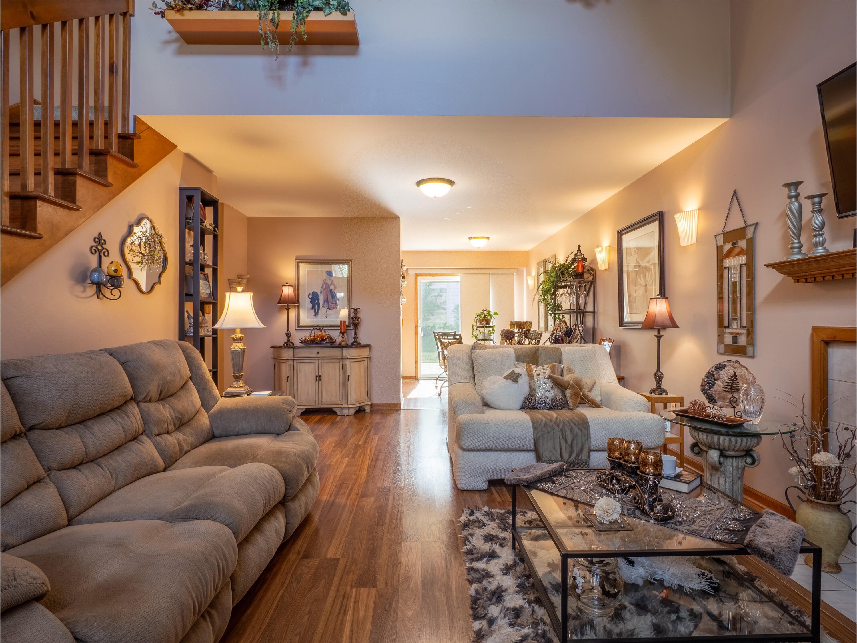 1362 West 94th Court Crown Point, IN 46307 - Photo 4 of 23 a living room with furniture kitchen view and a chandelier