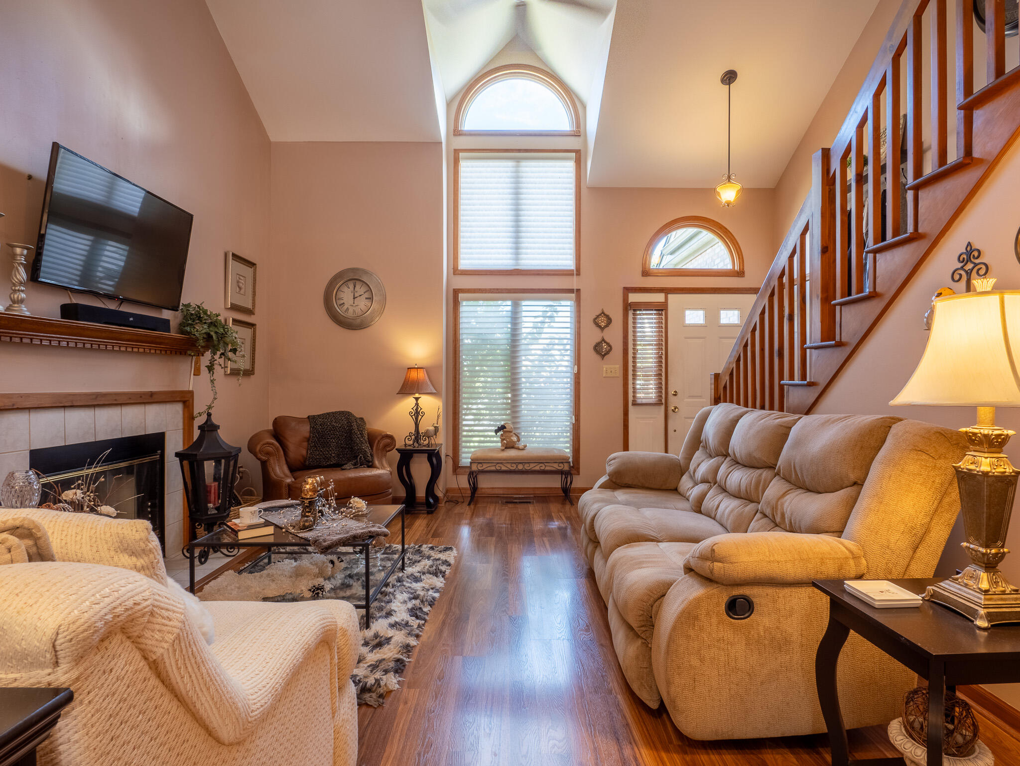 1362 West 94th Court Crown Point, IN 46307 - Photo 5 of 23 a living room with fireplace furniture and a flat screen tv