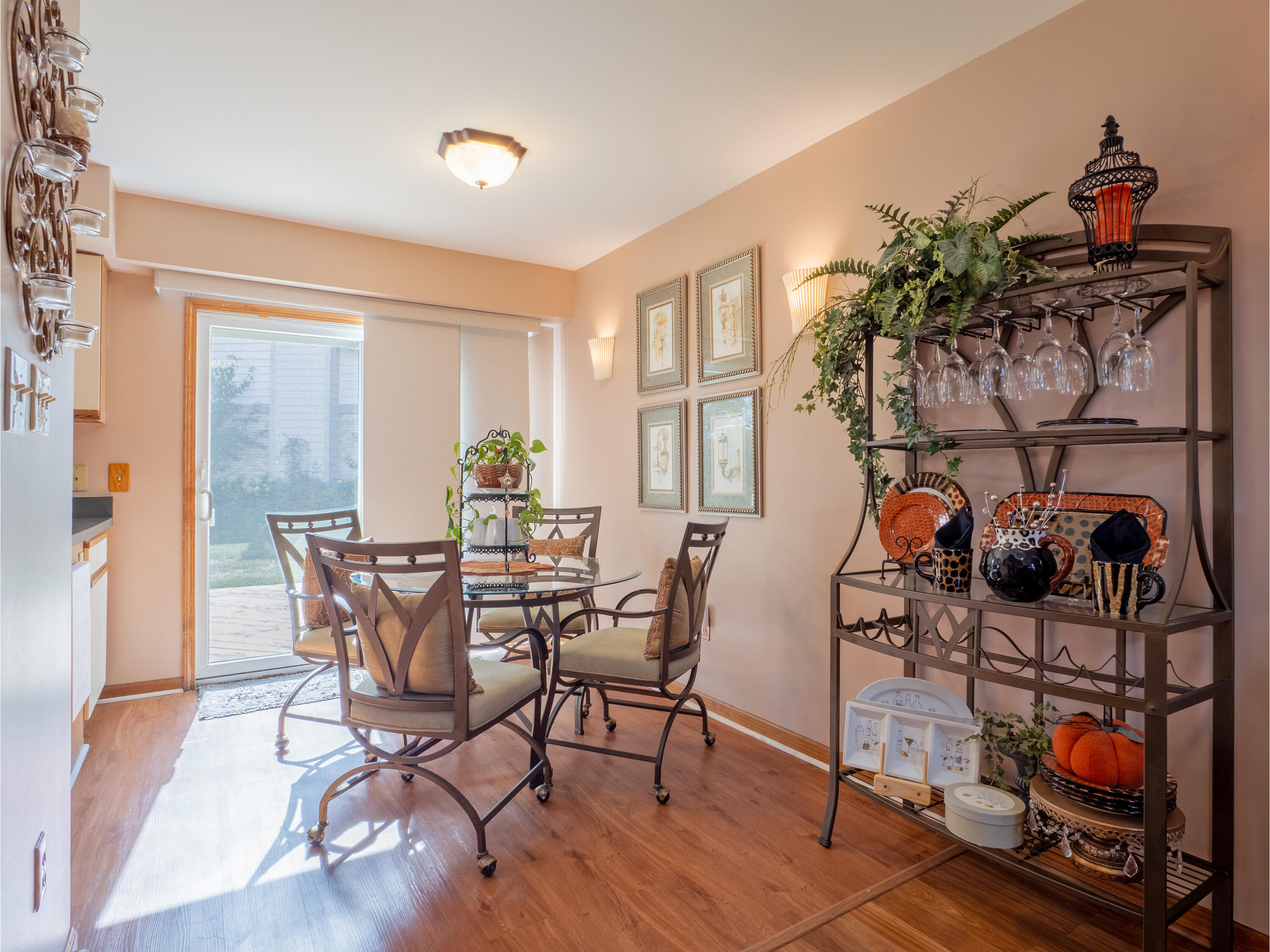 1362 West 94th Court Crown Point, IN 46307 - Photo 7 of 23 a view of a dining room with furniture wooden floor and a carpet
