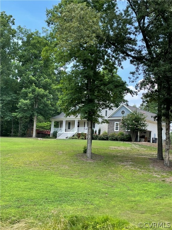 20710 River Road Chesterfield, VA 23838 - Photo 1 of 24 a house with a big yard and large trees