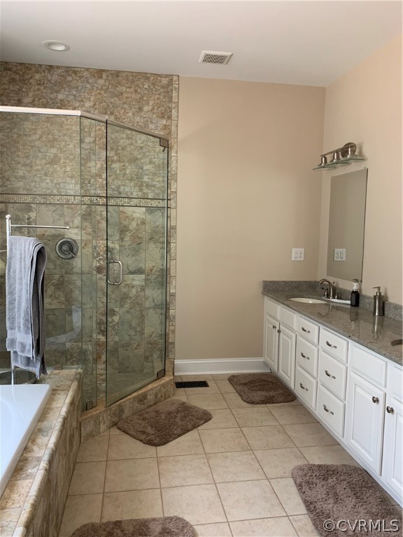 20710 River Road Chesterfield, VA 23838 - Photo 11 of 24 a bathroom with a granite countertop sink a toilet and shower